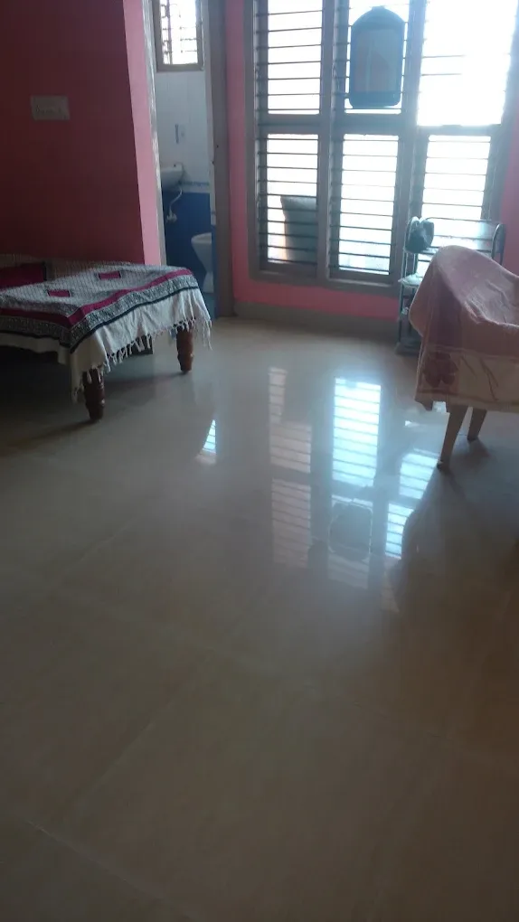 Boys PG room with cot and attached bathroom